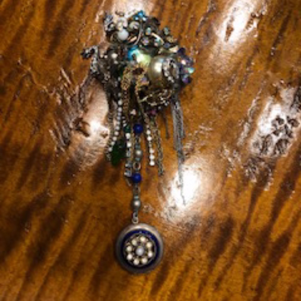 Signed Brooch with hanging locket1988